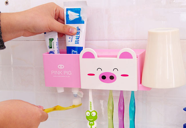 Dụng cụ treo bàn chải và kem đánh răng hình chú heo